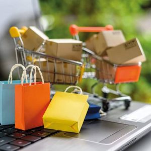 shopping carts stand on laptop
