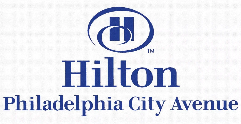 Hilton logo with circular emblem and the word Hilton in blue followed by the text Philadelphia City Avenue below branding image