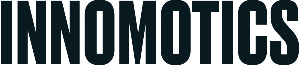 Logo with the brand name INNOMOTICS in tall bold dark letters on a white background