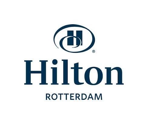 Hilton Rotterdam logo blue wordmark with circular crest above the text Hilton
