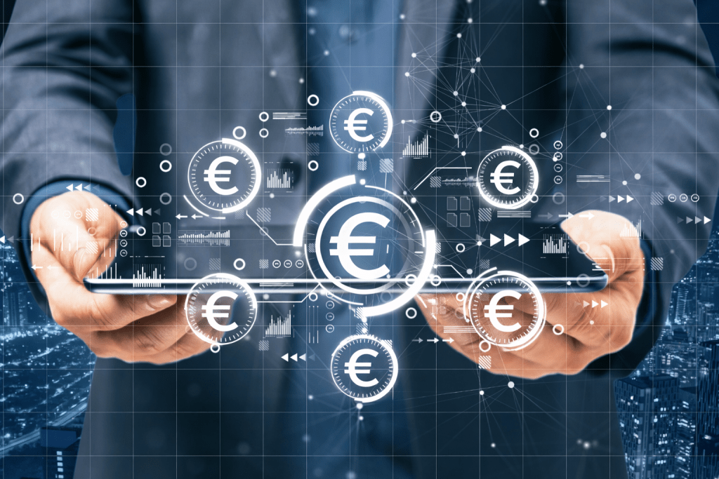 Hands holding a tablet with glowing euro currency icons and interconnected digital networks illustrating fintech Informative